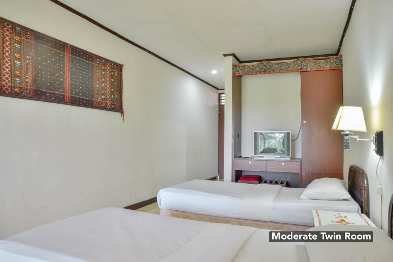 โรงแรม ชิลลินตง Ambarita ภายนอก รูปภาพ