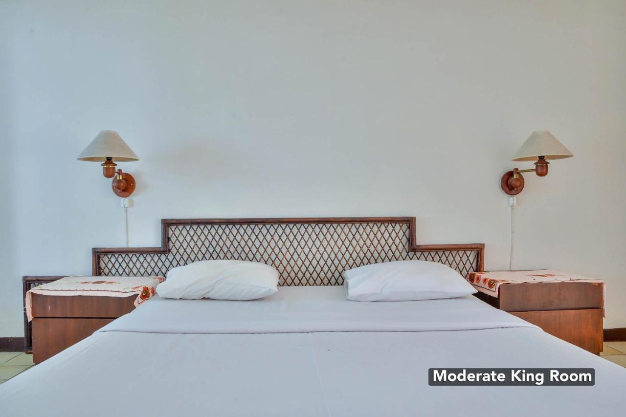 โรงแรม ชิลลินตง Ambarita ภายนอก รูปภาพ