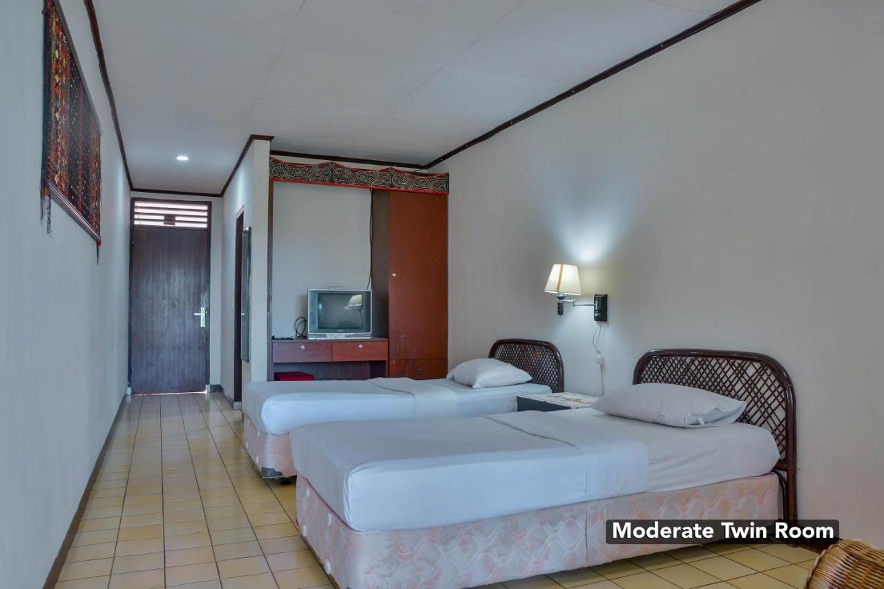 โรงแรม ชิลลินตง Ambarita ภายนอก รูปภาพ